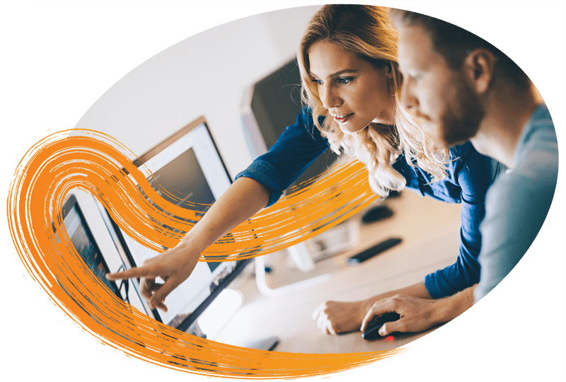 two-people-looking-at-a-monitor
